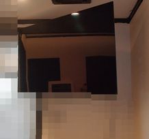 愛知県名古屋市 木造住宅 有機ELテレビ 壁掛け首振り 取付設置工事画像